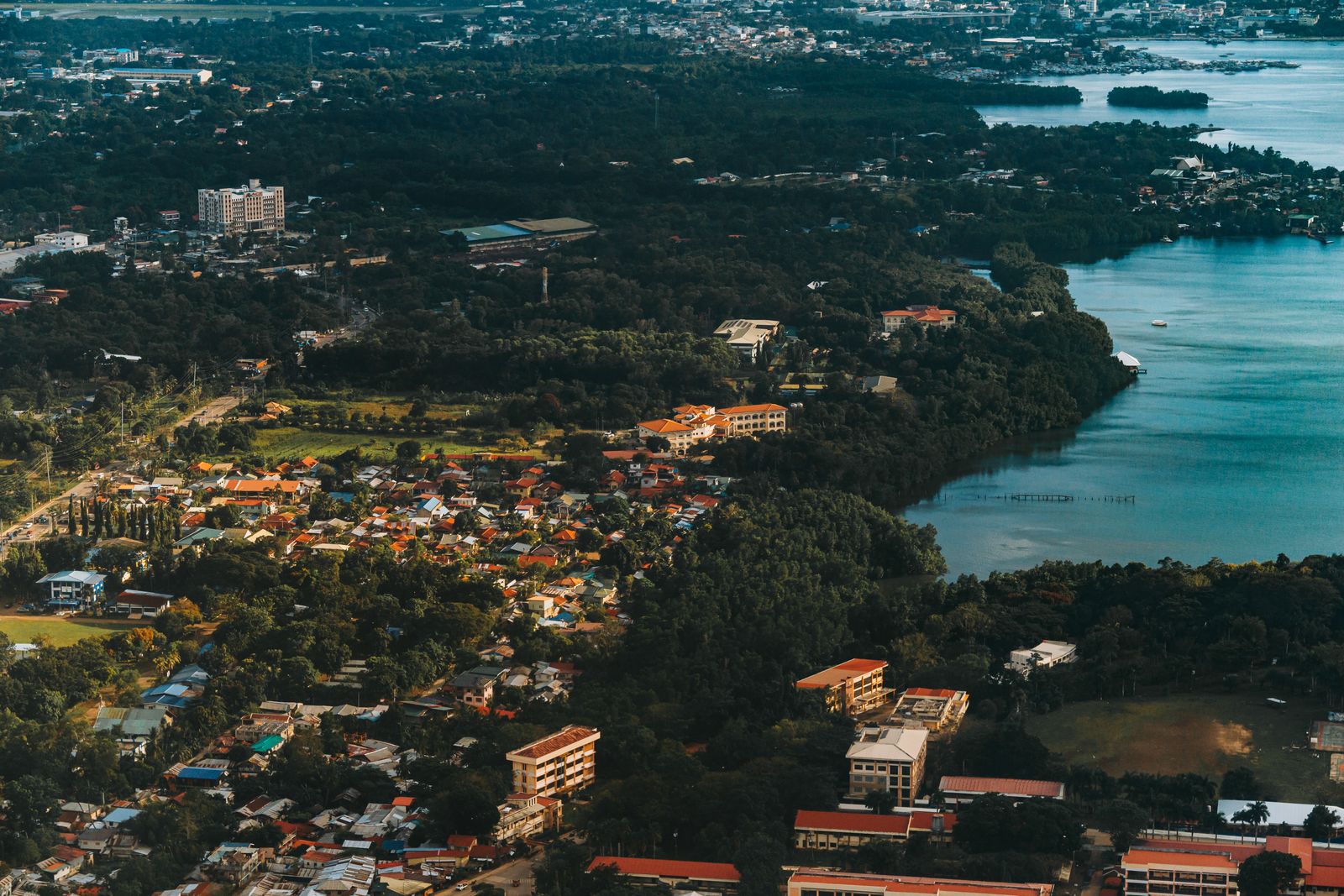 Aerial view of waterfront homes and private piers