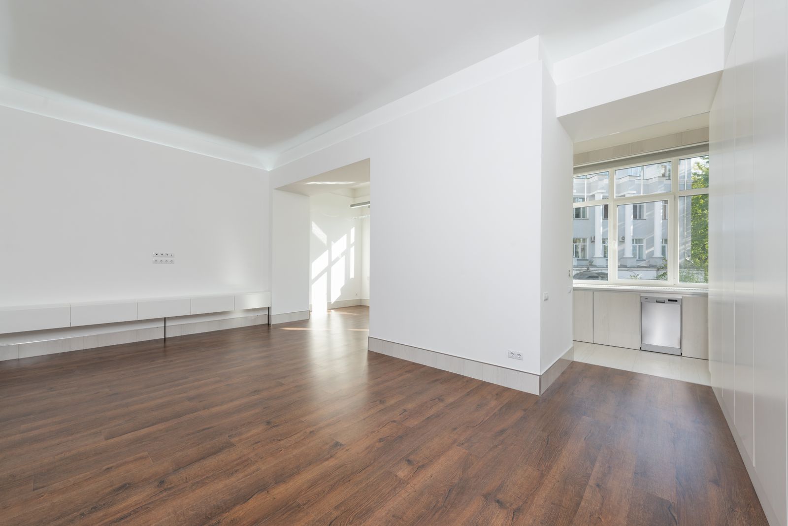 Living room before staging, empty and dated